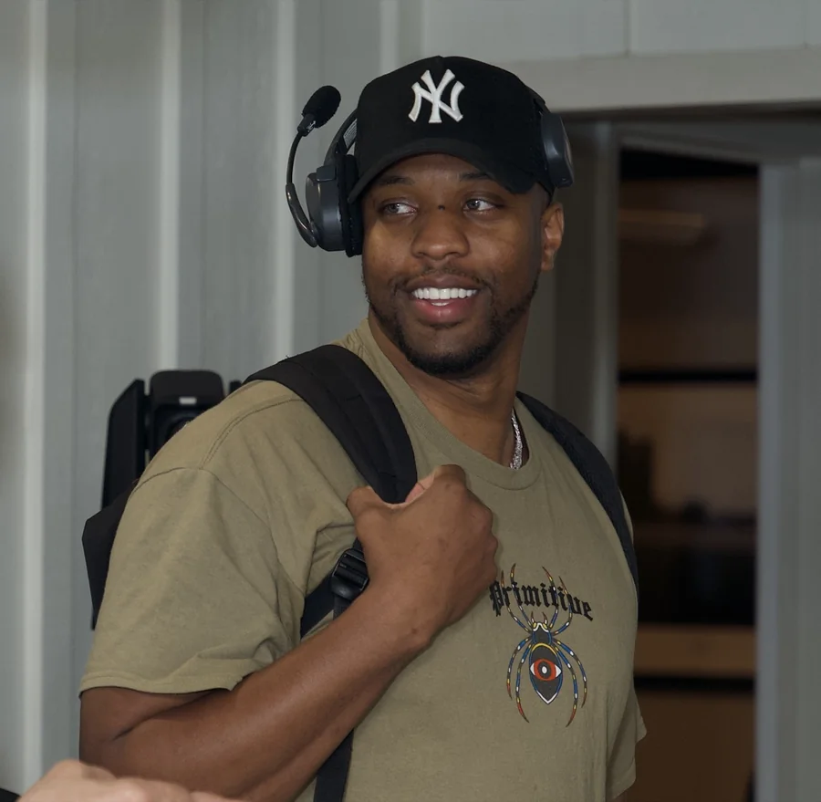 Crew member on headset comms during production