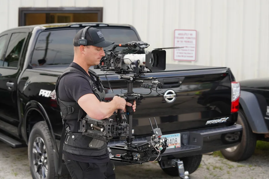 Operator on a steadicam rig during a shoot